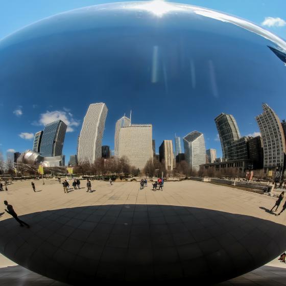 Buildings reflected in the "egg" sculpture in Chicago's Millenium park 